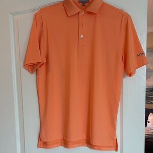 Peter Millar Orange Polo Shirt with Ponte Vedra Inn and Club logo on sleeve